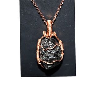 Blk/copper wrapped Tektite energy stone pendant